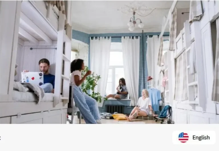 College students in a shared dorm room with a laptop, a setting where a compact power station is useful