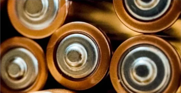 Close-up of copper-top battery cells representing new battery chemistry research